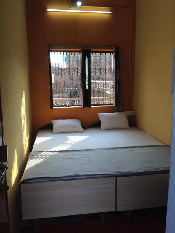 Paradise Inn Guest House Varanasi Værelse billede